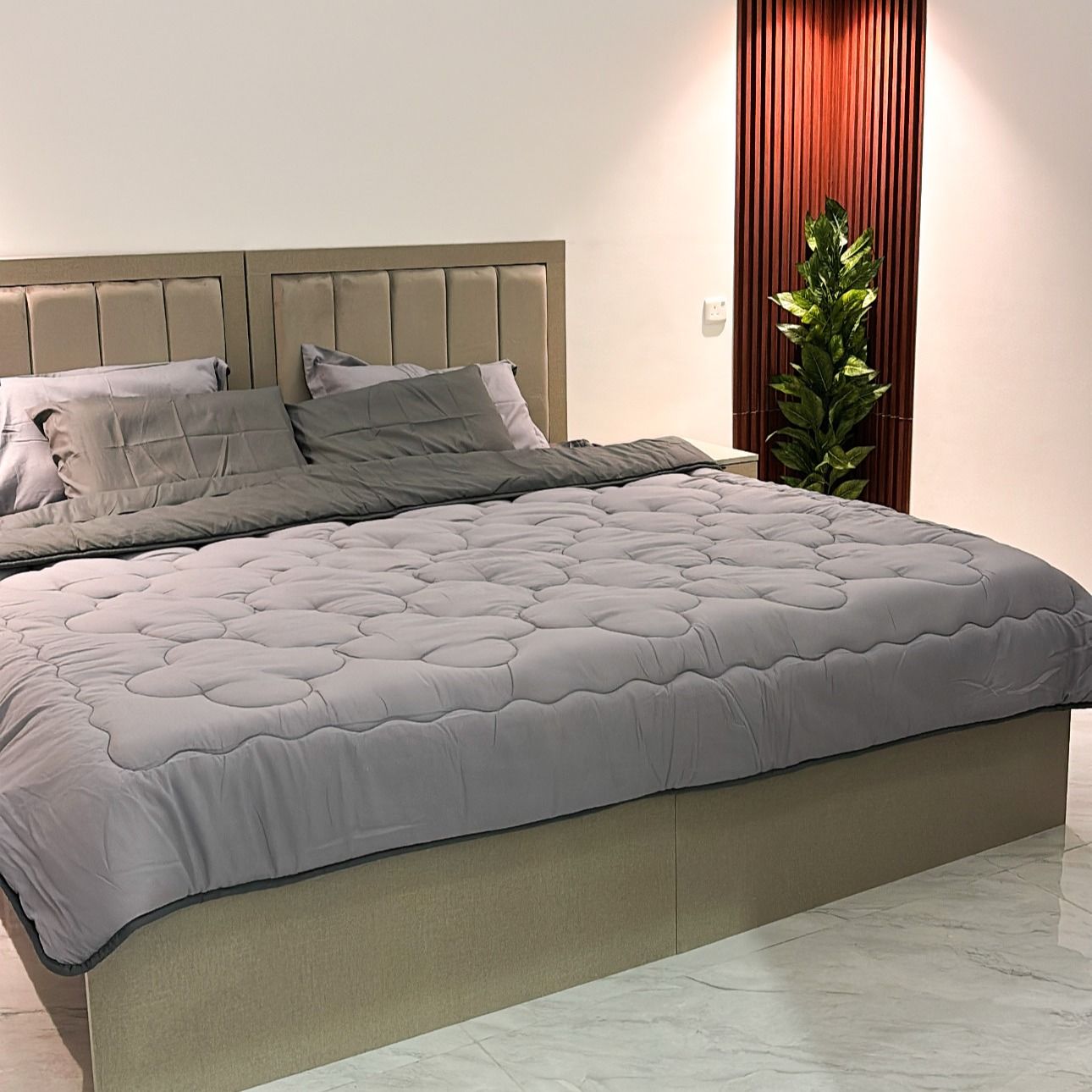 An upscale apartment in a bedroom and a lounge