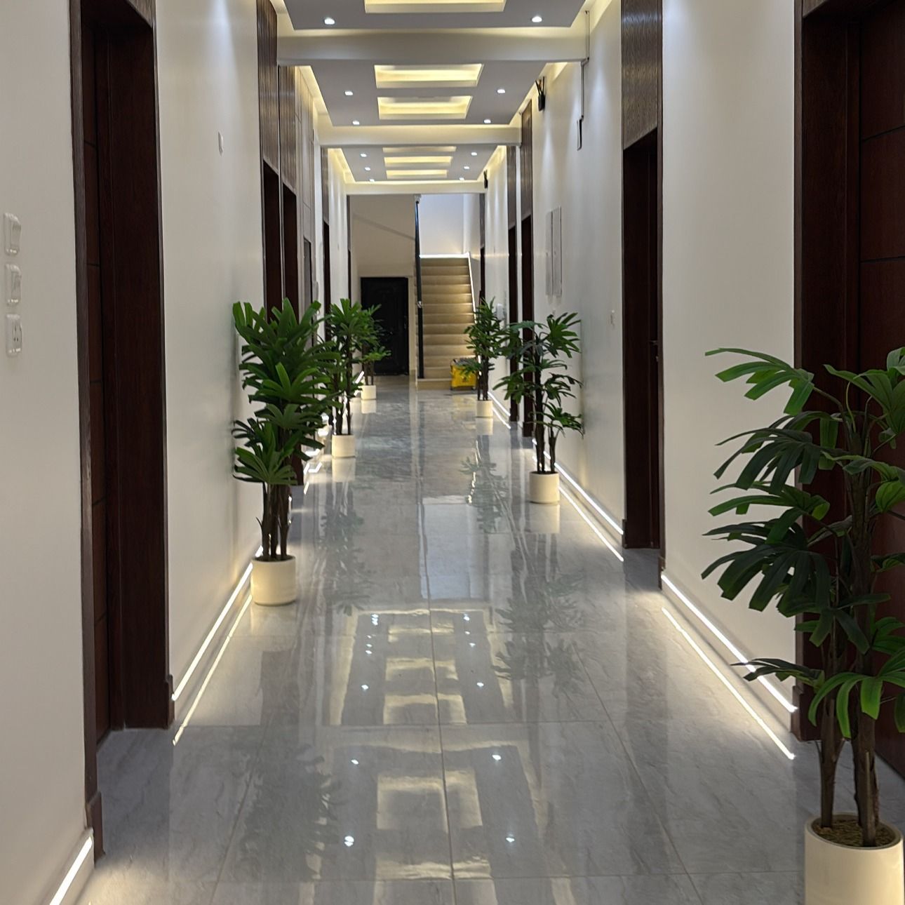 An upscale apartment in a bedroom and a lounge